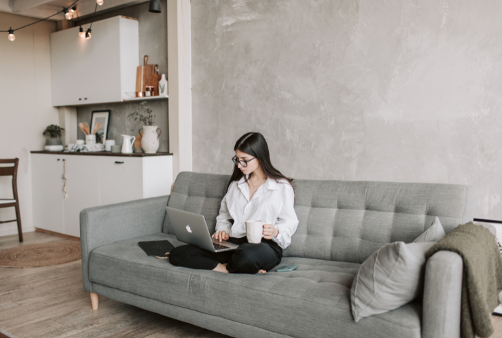 Young woman working calmly with purpose