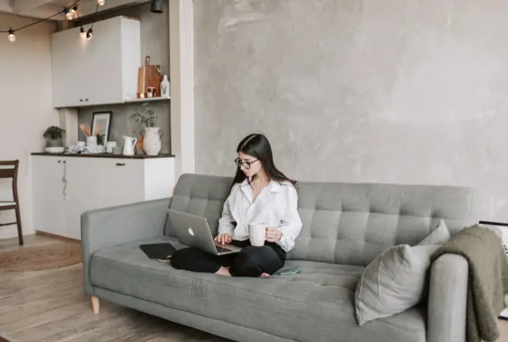 Young woman working calmly with purpose
